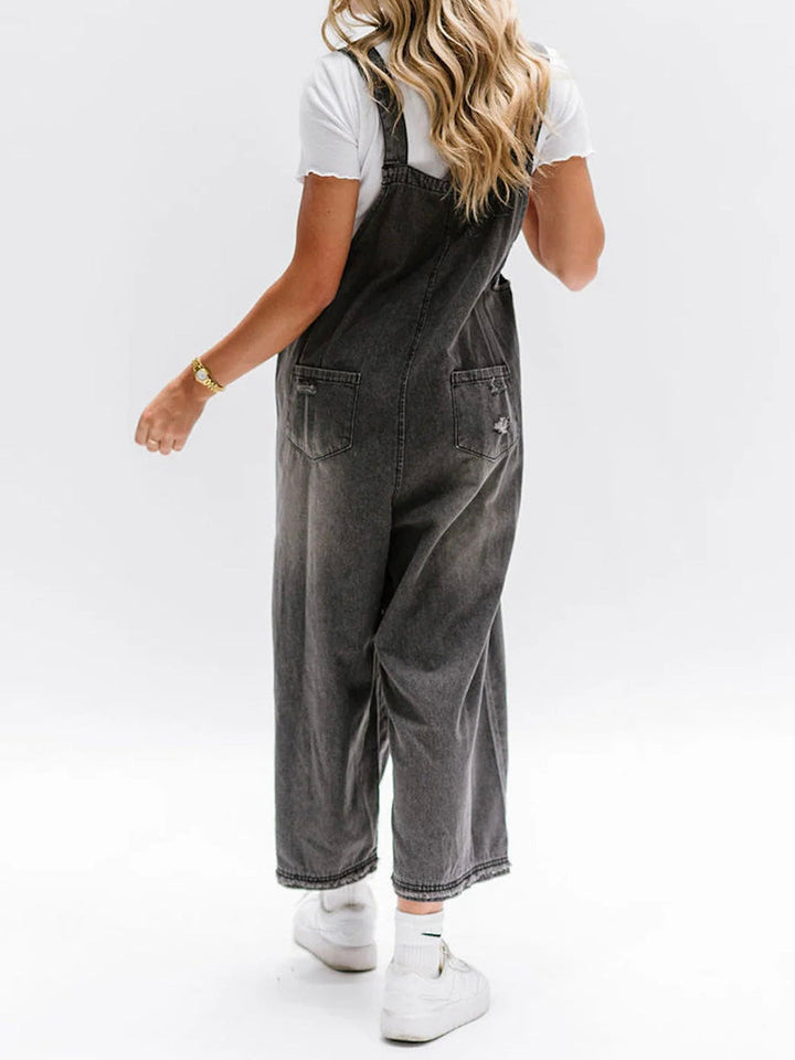 CALI - RELAXED DISTRESSED DENIM JUMPSUIT