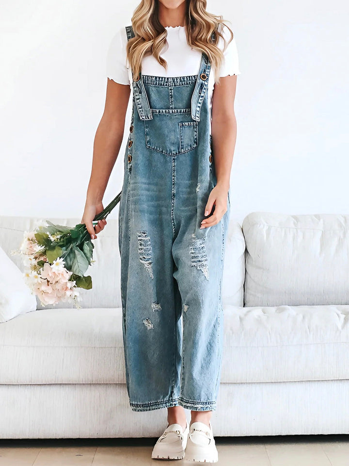 CALI - RELAXED DISTRESSED DENIM JUMPSUIT