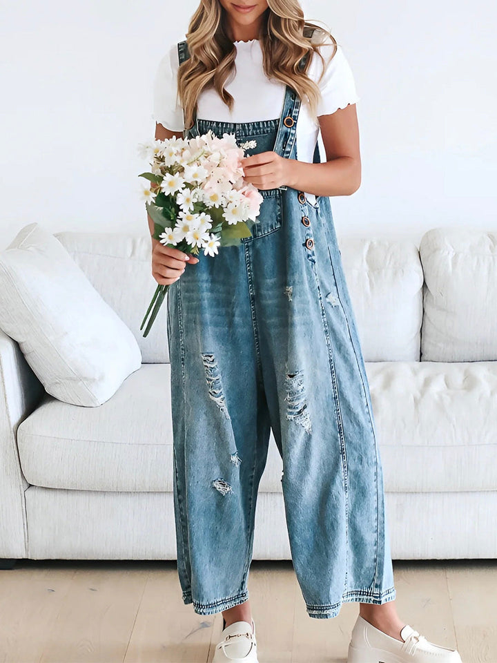 CALI - RELAXED DISTRESSED DENIM JUMPSUIT