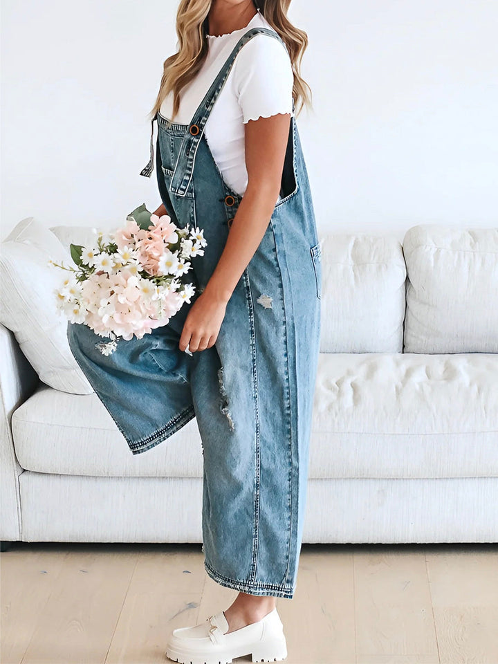 CALI - RELAXED DISTRESSED DENIM JUMPSUIT